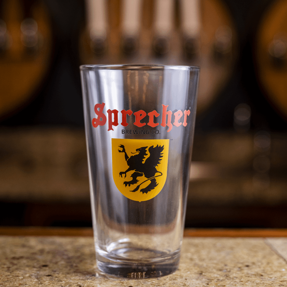 Empty Sprecher Pint Glass on a bar