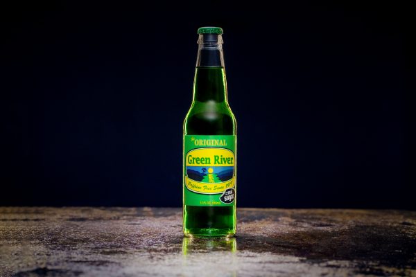 A bottle of green river on a black background
