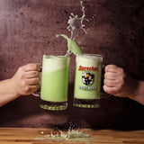 Hands clinking two mugs full of green river together