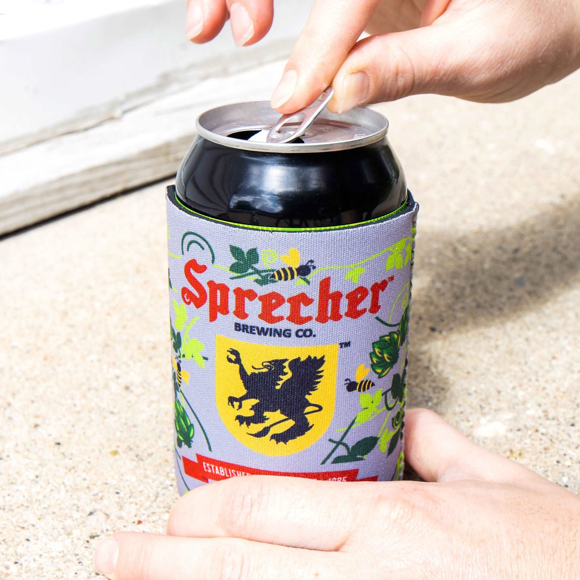 https://sprecherbrewery.com/cdn/shop/files/Koozie2-a57298e9-ffcf-4505-a31d-485379a96126-_1.jpg?v=1694113644&width=1920