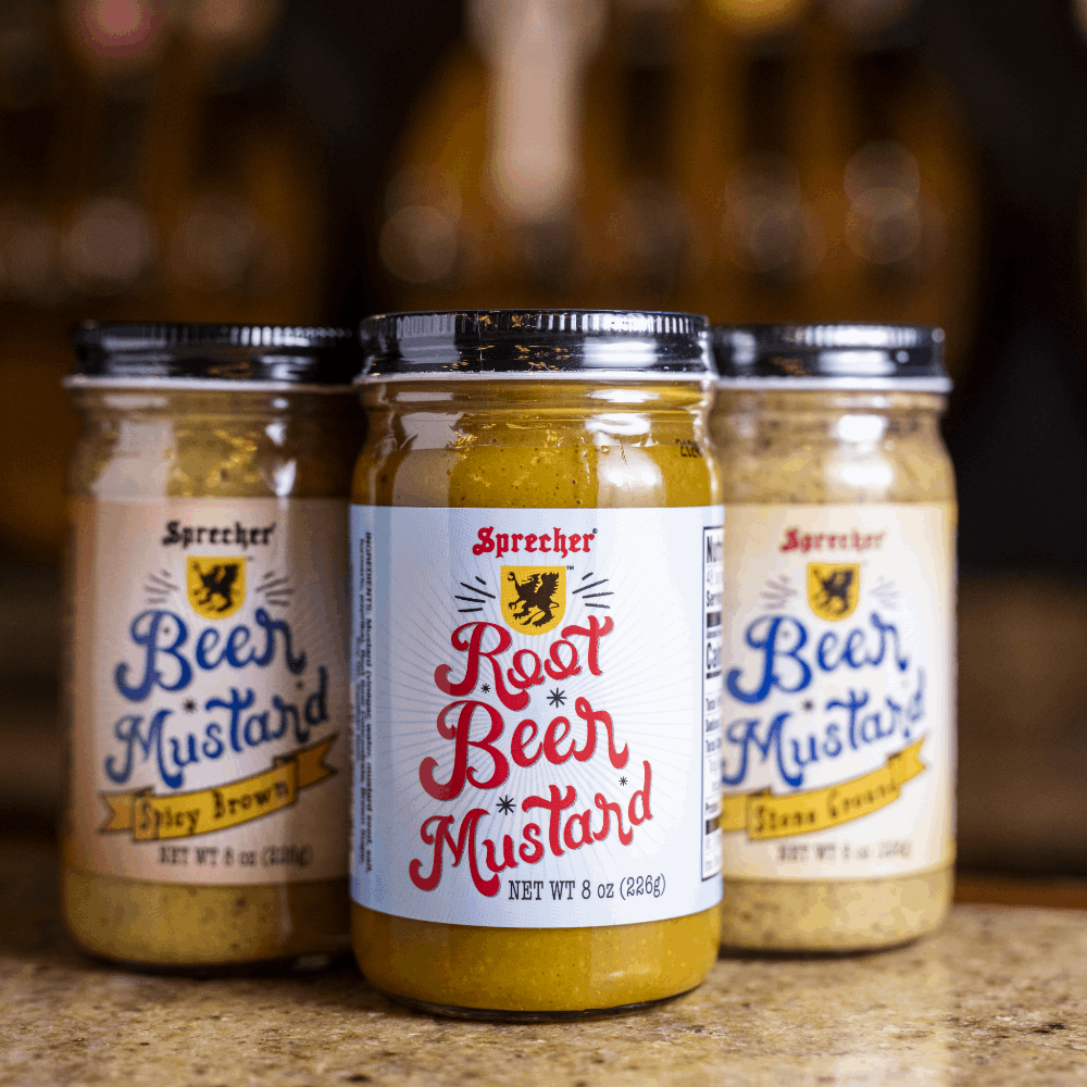 3 8oz Jars of Sprecher Mustard on a bar