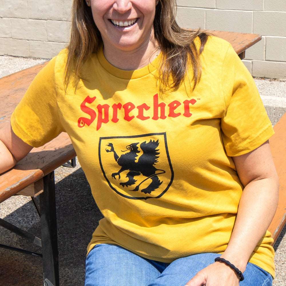Woman wearing a Yellow Sprecher Logo T-Shirt